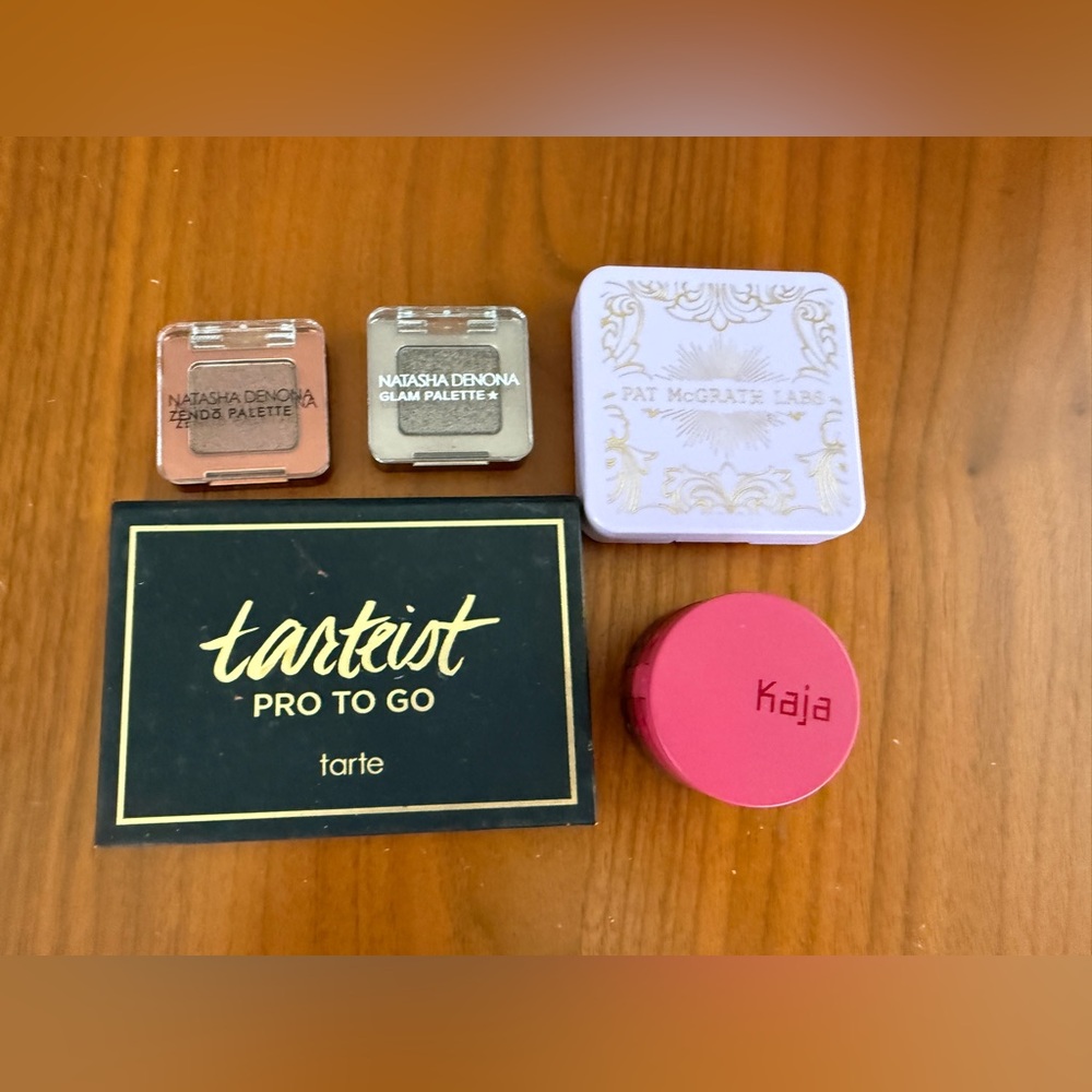 Various eyeshadow singles and palettes